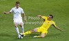 Valter Birsa (no.10) of Slovenia (L) and Vlad Chiriches (no.6) of Romania (R) during friendly football match between Slovenia and Romania. Match between Slovenia and Romania was played in Stozice arena in Ljubljana, Slovenia, on Wednesday, 15th of August 2012.
