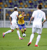 Jakob Johansson of Sweden (M) between Kevin Kampl of Slovenia (L) and Dejan Trajkovski of Slovenia (R) during UEFA U-21 Euro 2013 qualification football match between Slovenia and Sweden. Match between Slovenia and Sweden was played in Ljudski Vrt arena in Maribor, Slovenia, on Thursday, 6th of September 2012.
