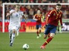 Teemu Pukki of Finland (L) and Gerard Pique of Spain (R) during the FIFA World Cup Qualifier Match between Spain and Finland at the El Molinon Stadium, Gijon, Spain, on Friday, 22nd of March 2013.
