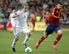 Teemu Pukki of Finland (L) and Gerard Pique of Spain (R) during the FIFA World Cup Qualifier Match between Spain and Finland at the El Molinon Stadium, Gijon, Spain, on Friday, 22nd of March 2013.
