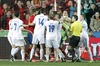 Players of Finland and Spain have words during the FIFA World Cup Qualifier Match between Spain and Finland at the El Molinon Stadium, Gijon, Spain, on Friday, 22nd of March 2013.
