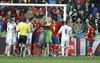 Players of Finland and Spain have words during the FIFA World Cup Qualifier Match between Spain and Finland at the El Molinon Stadium, Gijon, Spain, on Friday, 22nd of March 2013.
