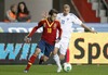 Jordi Alba of Spain (L) and Kari Arkivuo of Finland (R) during the FIFA World Cup Qualifier Match between Spain and Finland at the El Molinon Stadium, Gijon, Spain, on Friday, 22nd of March 2013.
