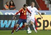 Jordi Alba of Spain (L) and Kari Arkivuo of Finland (R) during the FIFA World Cup Qualifier Match between Spain and Finland at the El Molinon Stadium, Gijon, Spain, on Friday, 22nd of March 2013.
