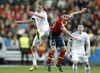 Teemu Tainio of Finland (R) and Santi Cazorla of Spain (L)  during the FIFA World Cup Qualifier Match between Spain and Finland at the El Molinon Stadium, Gijon, Spain, on Friday, 22nd of March 2013.
