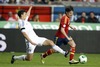 David Jimenez Silva of Spain (R) and Niklas Moisander of Finland (L) during the FIFA World Cup Qualifier Match between Spain and Finland at the El Molinon Stadium, Gijon, Spain, on Friday, 22nd of March 2013.
