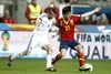 David Jimenez Silva of Spain (R) and Perparim Hetemaj of Finland (L) during the FIFA World Cup Qualifier Match between Spain and Finland at the El Molinon Stadium, Gijon, Spain, on Friday, 22nd of March 2013.
