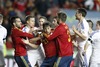 Spanish players Alvaro Negredo (l), David Jimenez Silva (c) and Gerard Pique have words with Finnish players during the FIFA World Cup Qualifier Match between Spain and Finland at the El Molinon Stadium, Gijon, Spain, on Friday, 22nd of March 2013.
