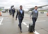 David Alaba and Diego Contento of FC Bayern Munich arrive at the City Airport before UEFA Champions League final match between FC Bayern Munich and Borussia Dortmund. Team of FC Bayern Munich arrived to City Airport, London, Great Britain on Friday, 24th of May 2013.

