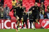 Robert Lewandowski and Marco Reus during training session on Wembley Stadium, London, Great Britain, prior to the UEFA Champions League final match between FC Bayern Munich and Borussia Dortmund. Training session was held on Wembley stadium in London, Great Britain on Friday, 24th of May 2013.
