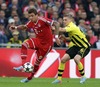 Mario Mandzukic of FC Bayern Muenchen and Lukasz Piszczek of Borussia Dortmund during UEFA Champions League final match between FC Bayern Munich and Borussia Dortmund. Final match of UEFA Champions League between FC Bayern and Borussia Dortmunad was played on Wembley stadium in London, Great Britain on Saturday, 25th of May 2013.

