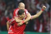 Arjen Robben and Mario Gomez of FC Bayern Muenchen celebrate goal during the DFB Pokal Final Match between FC Bayern Munich and VfB Stuttgart. DFB Pokal Final Match between FC Bayern Munich and VfB Stuttgart was held at the Olympiastadium in Berlin, Germany on Saturday, 1st of June 2013.
