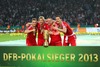 Players of FC Bayern Muenchen celebrate their victory in the DFB Pokal Final Match between FC Bayern Munich and VfB Stuttgart. DFB Pokal Final Match between FC Bayern Munich and VfB Stuttgart was held at the Olympiastadium in Berlin, Germany on Saturday, 1st of June 2013.
