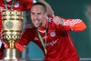 Franck Ribery of FC Bayern Muenchens celebrates victory with trophy after the DFB Pokal Final Match between FC Bayern Munich and VfB Stuttgart. DFB Pokal Final Match between FC Bayern Munich and VfB Stuttgart was held at the Olympiastadium in Berlin, Germany on Saturday, 1st of June 2013.
