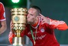 Franck Ribery of FC Bayern Muenchens celebrates victory with trophy after the DFB Pokal Final Match between FC Bayern Munich and VfB Stuttgart. DFB Pokal Final Match between FC Bayern Munich and VfB Stuttgart was held at the Olympiastadium in Berlin, Germany on Saturday, 1st of June 2013.
