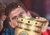 Mario Gomez of FC Bayern Muenchen with trophy after the DFB Pokal Final Match between FC Bayern Munich and VfB Stuttgart. DFB Pokal Final Match between FC Bayern Munich and VfB Stuttgart was held at the Olympiastadium in Berlin, Germany on Saturday, 1st of June 2013.
