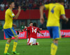 Zlatko Junuzovic and Julian Baumgartlinger of Austria celebrate their victory during FIFA World Cup Qualifier Match between Austria and Sweden. FIFA World Cup Qualifier Match between Austria and Sweden was played on Ernst Happel Stadium in Vienna, Austria, on Friday, 7th of June 2013.
