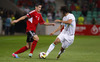 Odise Roshi of Albania (L) and Rene Krhin of Slovenia (R) during FIFA World cup 2014 qualification football match between Slovenia and Albania. Match between Slovenia and Albania was played in Stozice arena in Ljubljana, Slovenia, on Friday, 6th of September 2013.
