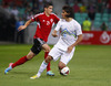Odise Roshi of Albania (L) and Rene Krhin of Slovenia (R) during FIFA World cup 2014 qualification football match between Slovenia and Albania. Match between Slovenia and Albania was played in Stozice arena in Ljubljana, Slovenia, on Friday, 6th of September 2013.
