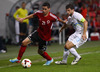 Odise Roshi of Albania (L) and Bojan Jokic of Slovenia (R) during FIFA World cup 2014 qualification football match between Slovenia and Albania. Match between Slovenia and Albania was played in Stozice arena in Ljubljana, Slovenia, on Friday, 6th of September 2013.
