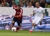 Valdet Rama of Albania (L)  and Miso Brecko of Slovenia (R) during FIFA World cup 2014 qualification football match between Slovenia and Albania. Match between Slovenia and Albania was played in Stozice arena in Ljubljana, Slovenia, on Friday, 6th of September 2013.
