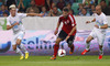 Valdet Rama of Albania (M) between Kevin Kampl of Slovenia (L) and Miso Brecko of Slovenia (R) during FIFA World cup 2014 qualification football match between Slovenia and Albania. Match between Slovenia and Albania was played in Stozice arena in Ljubljana, Slovenia, on Friday, 6th of September 2013.
