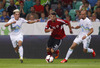 Valdet Rama of Albania (M) between Kevin Kampl of Slovenia (L) and Miso Brecko of Slovenia (R) during FIFA World cup 2014 qualification football match between Slovenia and Albania. Match between Slovenia and Albania was played in Stozice arena in Ljubljana, Slovenia, on Friday, 6th of September 2013.
