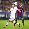 AC Milans Andrea Poli (left) and FC Barcelonas Neymar Santos Jr (right) during UEFA Champions League group H match between FC Barcelona and AC Milan at the Camp Nou in Barcelona, Spain on 2013/11/06.
