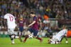 FC Barcelonas Leo Messi (center) and AC Milans Cristian Zapata (left) and Nigel De Jong (right) during UEFA Champions League group H match between FC Barcelona and AC Milan at the Camp Nou in Barcelona, Spain on 2013/11/06.
