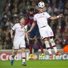 FC Barcelonas Gerard Pique (center) and AC Milans Riccardo Montolivo (left) and Philippe Mexes (right) during UEFA Champions League group H match between FC Barcelona and AC Milan at the Camp Nou in Barcelona, Spain on 2013/11/06.

