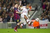 FC Barcelonas Leo Messi (left) and AC Milans Nigel De Jong (center) during UEFA Champions League group H match between FC Barcelona and AC Milan at the Camp Nou in Barcelona, Spain on 2013/11/06.
