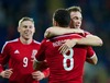 Wales Andy King celebrates scoring the first goal against Finland with team-mate Hal Robson-Kanu during the International Friendly match against at the Cardiff City Stadium, Great Britain on 2013/11/16.
