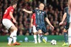 Michael Carrick #16 (Manchester United) and Arjen Robben #10 (FC Bayern Muenchen) during the UEFA Champions League Round of 8, 1nd Leg match between Manchester United and FC Bayern Muenchen at the Old Trafford in Manchester, Great Britain on 2014/04/01.
