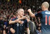 Bastian Schweinsteiger #31 (FC Bayern Muenchen) and Arjen Robben #10 (FC Bayern Muenchen) celebrate goal during the UEFA Champions League Round of 8, 1nd Leg match between Manchester United and FC Bayern Muenchen at the Old Trafford in Manchester, Great Britain on 2014/04/01.
