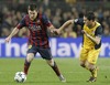 FC Barcelona Leo Messi (l) and Atletico de Madrid Koke during the UEFA Champions League Round of 8, 1st Leg match between FC Barcelona and Club Atletico de Madrid at the Camp Nou in Barcelona, Spain on 2014/04/02.
