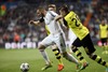 Real Madrid Karim Benzema and Borussia Dortmund Lukasz Piszcek during the UEFA Champions League Round of 8, 1st Leg match between Real Madrid and Borussia  at the Estadio Santiago Bernabeu in Madrid, Spain on 2014/04/02.
