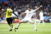 Real Madrid Xabi Alonso and Borussia Dortmund Henrikh Mkhitaryan during the UEFA Champions League Round of 8, 1nd Leg match between Real Madrid and Borussia Dortmund at the Estadio Santiago Bernabeu in Madrid, Spain on 2014/04/03.
