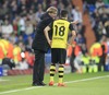 Head coach Juergen Klopp (Borussia Dortmund) and Nuri Sahin (Borussia Dortmund #18) during the UEFA Champions League Round of 8, 1st Leg match between Real Madrid and Borussia Dortmund at the Estadio Santiago Bernabeu in Madrid, Spain on 2014/04/02.
