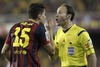 FC Barcelona Marc Bartra have words with the referee Antonio Mateu Lahoz during the Final Match of the Spanish Kings Cup, Copa del Rey, between Real Madrid and Fc Barcelona at the Mestalla Stadion in Valencia, Spain on 2014/04/16.
