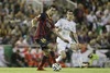 FC Barcelona Sergio Busquets (l) and Real Madrid Angel Di Maria during the Final Match of the Spanish Kings Cup, Copa del Rey, between Real Madrid and Fc Barcelona at the Mestalla Stadion in Valencia, Spain on 2014/04/16.
