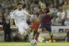 FC Barcelona Andres Iniesta (r) and Real Madrid Xabi Alonso during the Final Match of the Spanish Kings Cup, Copa del Rey, between Real Madrid and Fc Barcelona at the Mestalla Stadion in Valencia, Spain on 2014/04/16.
