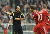 Referee Pedro Proenca (Portugal)in discussion with Thomas Mueller (FC Bayern Muenchen) during the UEFA Champions League Round of 4, 2nd Leg Match between FC Bayern Munich vs Real Madrid at the Allianz Arena in Muenchen, Germany on 2014/04/29.
