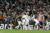 Real Madrid players celebrate goal in presence of Atletico de Madrid Gabi Fernandez dejected during the UEFA Champions League Final Match between Real Madrid and Atletico Madrid at the Estadio da Luz in Lissabon, Portugal on 2014/05/24.
