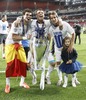 Real Madrid Pepe (l), Cristiano Ronaldo (c) and Fabio Coentrao celebrate the victory during the UEFA Champions League Final Match between Real Madrid and Atletico Madrid at the Estadio da Luz in Lissabon, Portugal on 2014/05/24.
