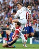 Real Madrid Garet Bale (c) and Atletico de Madrid Tiago Cardoso (r) and Diego Godin during the UEFA Champions League Final Match between Real Madrid and Atletico Madrid at the Estadio da Luz in Lissabon, Portugal on 2014/05/24.
