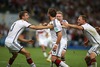 Mario Goetze (GER) celebrates his goal with Thomas Mueller (GER) and other teammates during Final match between Germany and Argentina of the FIFA Worldcup Brazil 2014 at the Maracana in Rio de Janeiro, Brazil on 2014/07/13. 
