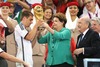 Brazilian president Dilma Roussef presents winning trophy to Philipp Lahm (GER), while FIFA president Joseph Blatter (R) observes after Final match between Germany and Argentina of the FIFA Worldcup Brazil 2014 at the Maracana in Rio de Janeiro, Brazil on 2014/07/13. 
