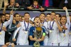 Real Madrids goalkeeper Iker Casillas lifts the trophy after his sides 2-0 victory over Sevilla during the UEFA Supercup Match between Real Madrid and FC Sevilla at the Millenium Stadium in Cardiff, Cardiff on 2014/08/12.
