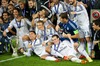 Real Madrids celebrate with the trophy after their 2-0 victory over Sevilla during the UEFA Super Cup at the Cardiff City Stadium. Cristiano Ronaldo, Gareth Bale, goalkeeper Iker Casillas, Isco, Sergio Ramos, head coach Carlo Ancelotti during the UEFA Supercup Match between Real Madrid and FC Sevilla at the Millenium Stadium in Cardiff, Cardiff on 2014/08/12.
