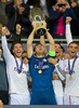 Real Madrids goalkeeper Iker Casillas lifts the trophy after his sides 2-0 victory over Sevilla during the UEFA Supercup Match between Real Madrid and FC Sevilla at the Millenium Stadium in Cardiff, Cardiff on 2014/08/12.
